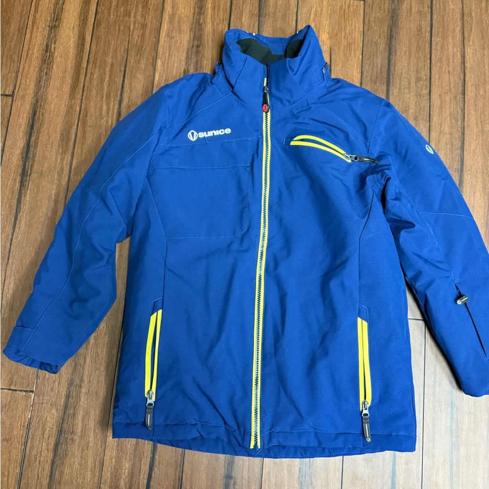 Sunice Kids Blue ski jacket.